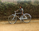 Niño en bicicleta Niño en bicicleta