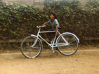 Niño en bicicleta Niño en bicicleta