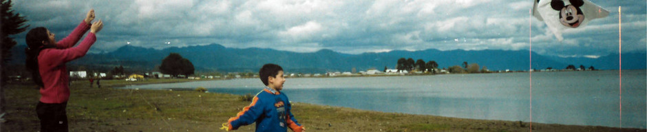 Elevando volantín en playa Pelluco