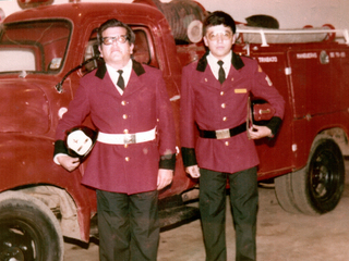 Padre e hijo bomberos Padre e hijo bomberos