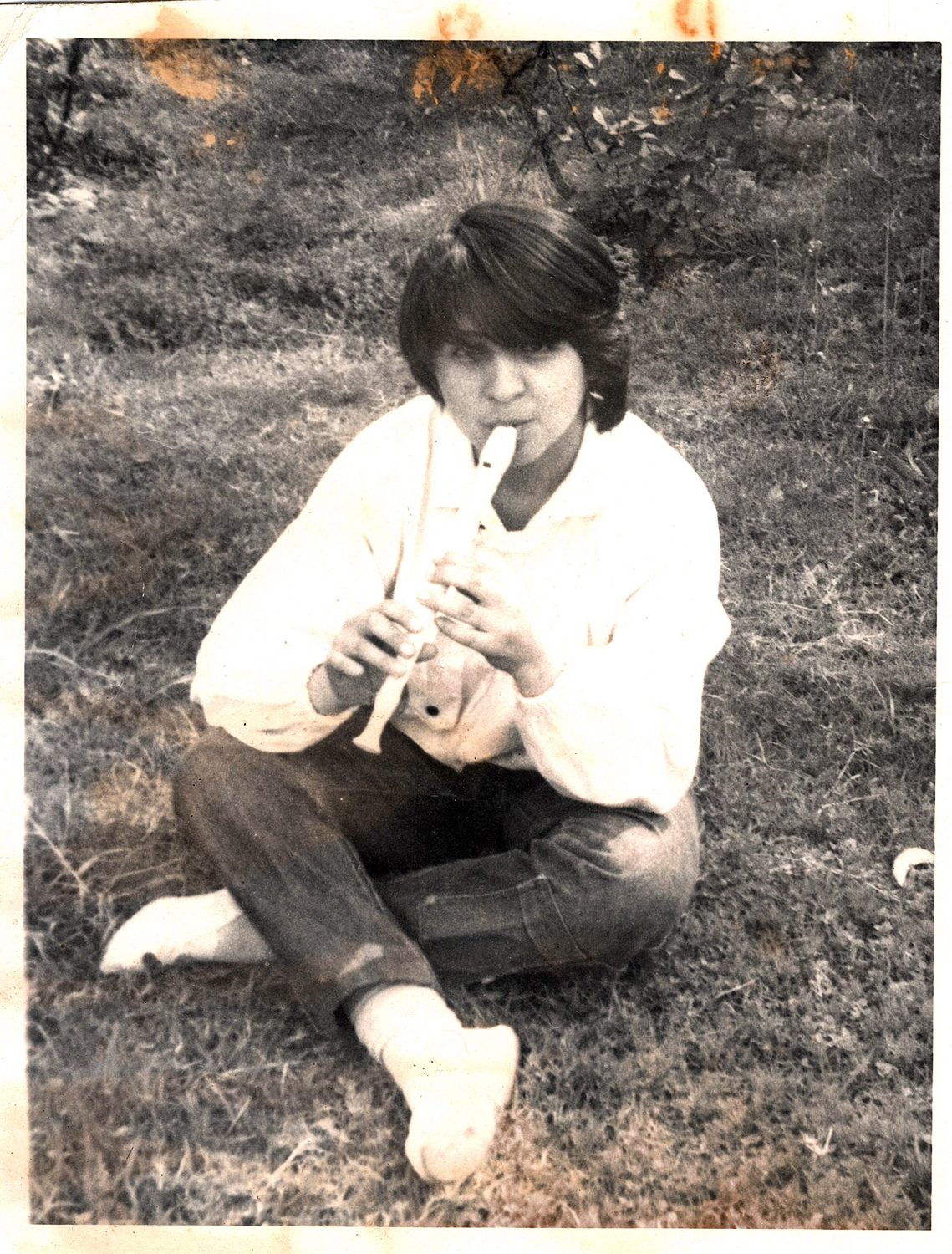 Tocando flauta Tocando flauta
