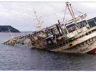 Embarcación hundida en Puerto Montt Embarcación hundida en Puerto Montt
