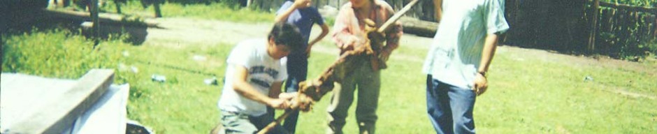 Preparación de un asado de cordero al palo