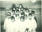 Profesora y sus estudiantes Profesora y sus estudiantes