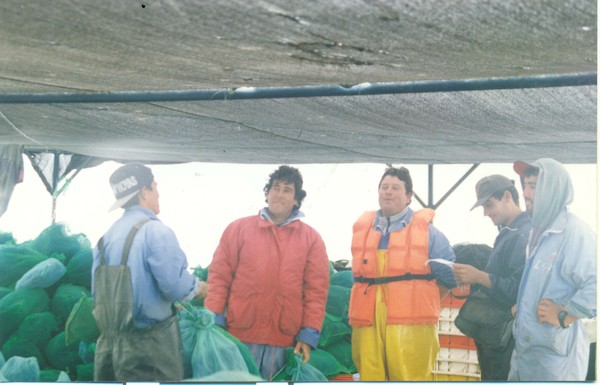 Trabajadores de cultivos marinos Trabajadores de cultivos marinos
