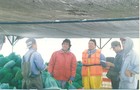Trabajadores de cultivos marinos Trabajadores de cultivos marinos