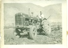 Conductor de tractor en un asentamiento de Cerrillos de Rapel