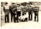 Grupo de huasos en un rodeo Grupo de huasos en un rodeo